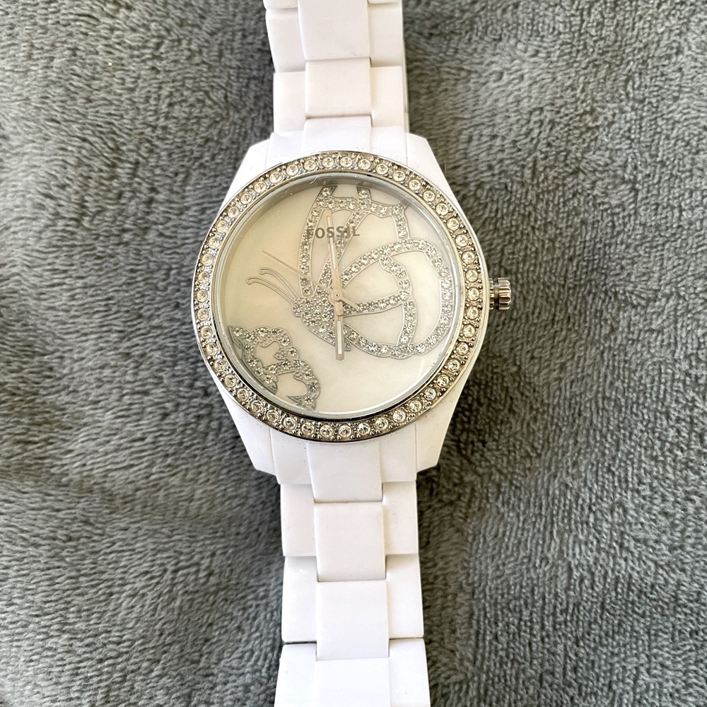 Beautiful, white, ceramic fossil watch with butterfly design